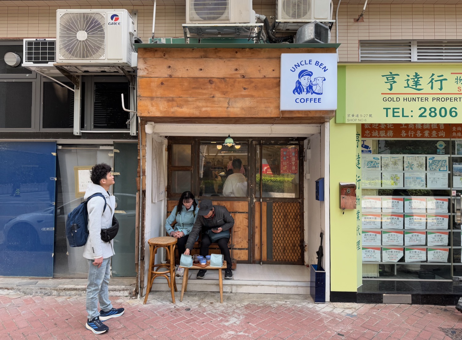 a group of people outside a store