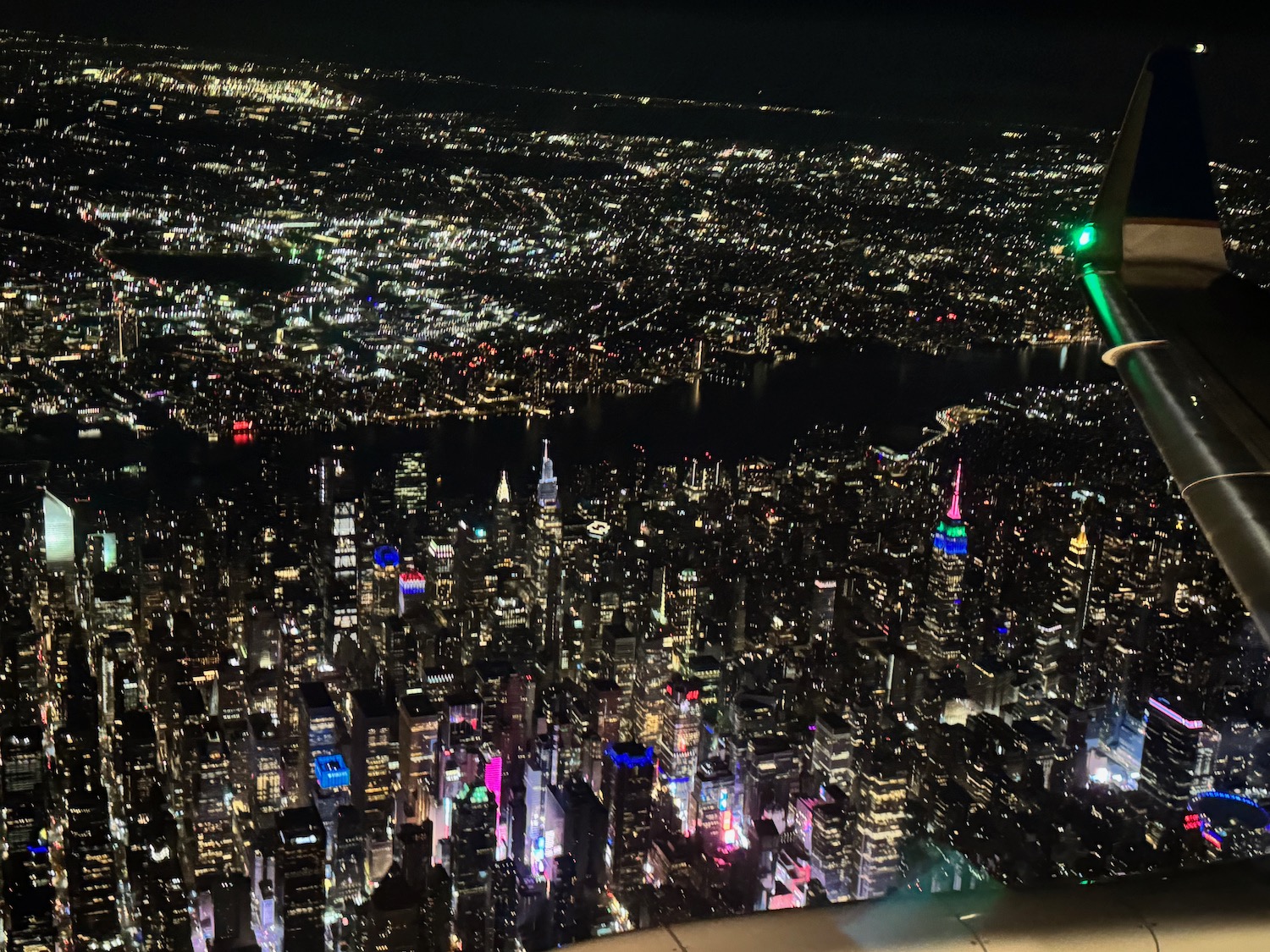 a city at night from an airplane