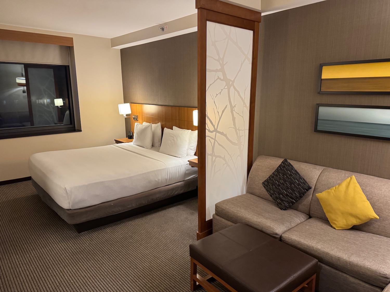a room with a bed and a couch