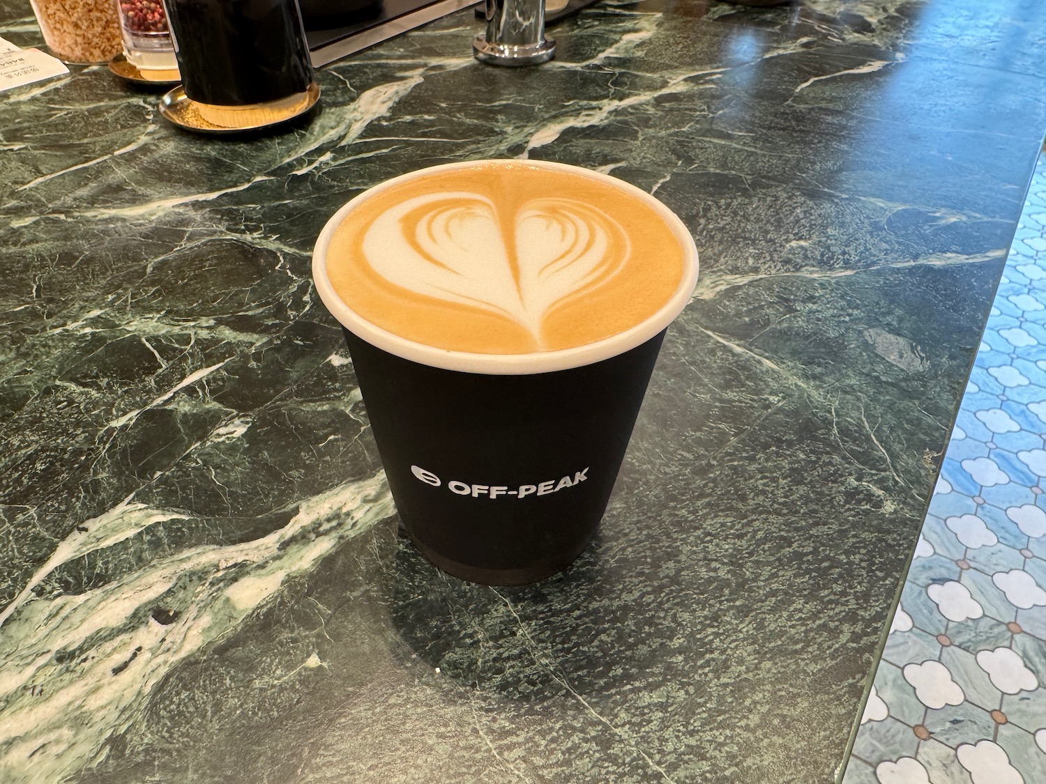 a cup of coffee on a table