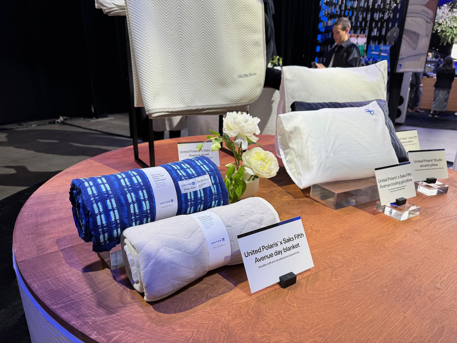 a table with blankets and pillows
