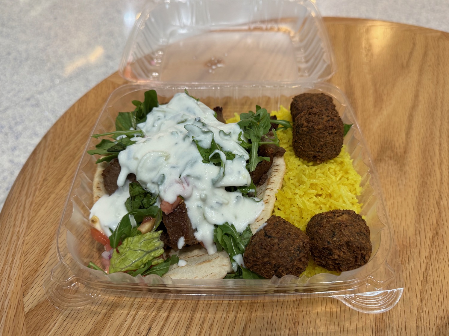 a plastic container with food in it