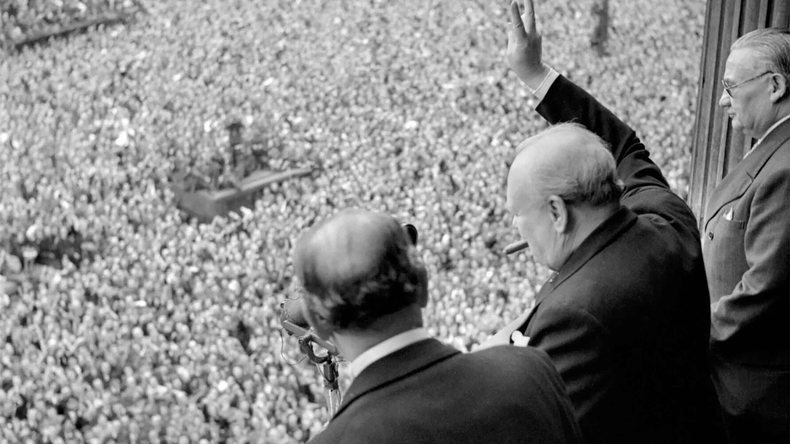 a man standing in front of a crowd