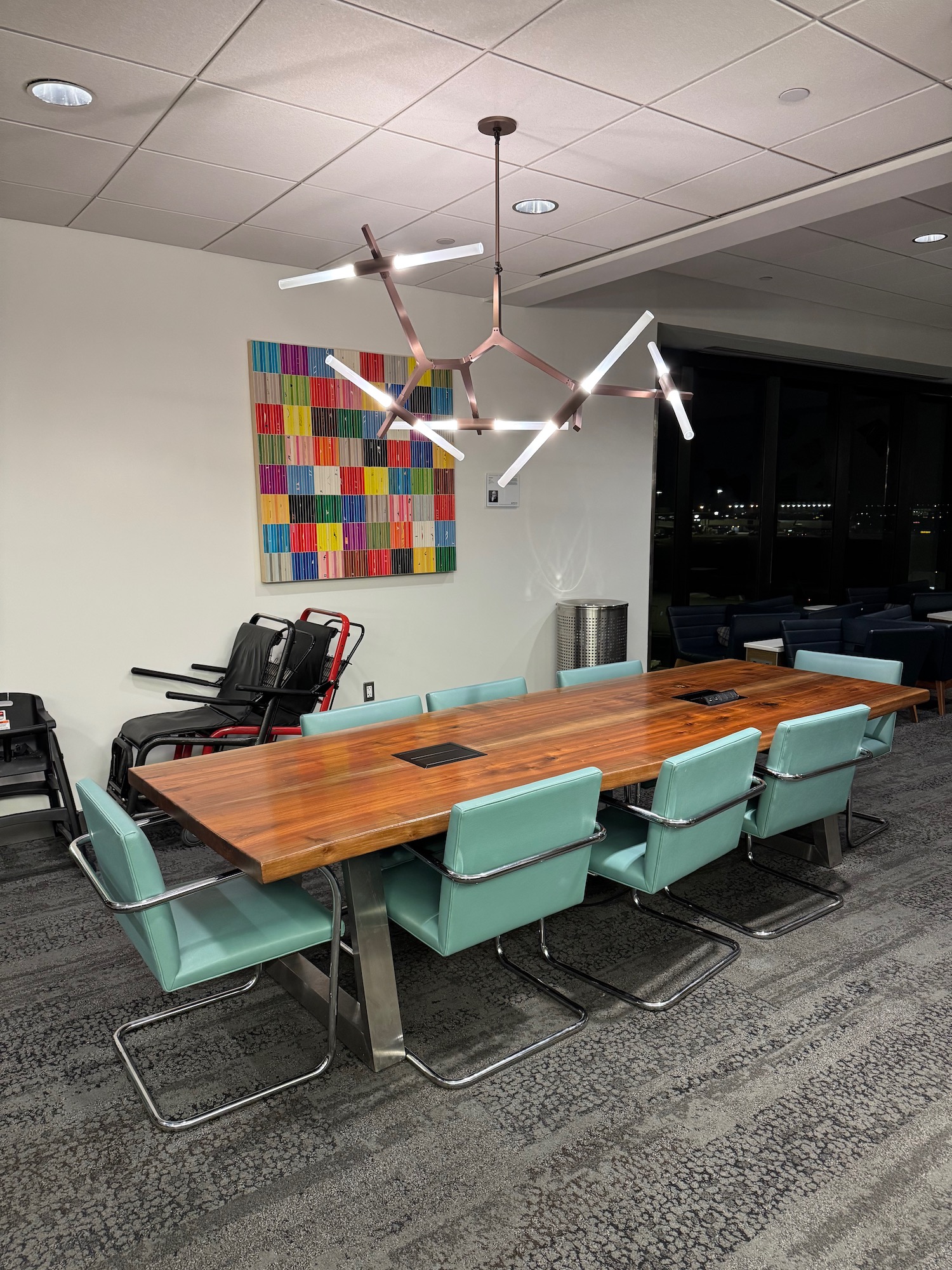 a conference room with a table and chairs
