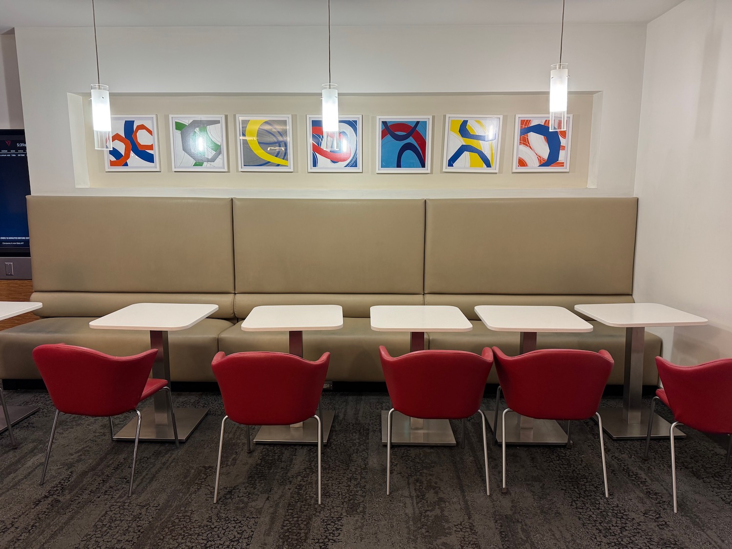 a group of tables and chairs in a room