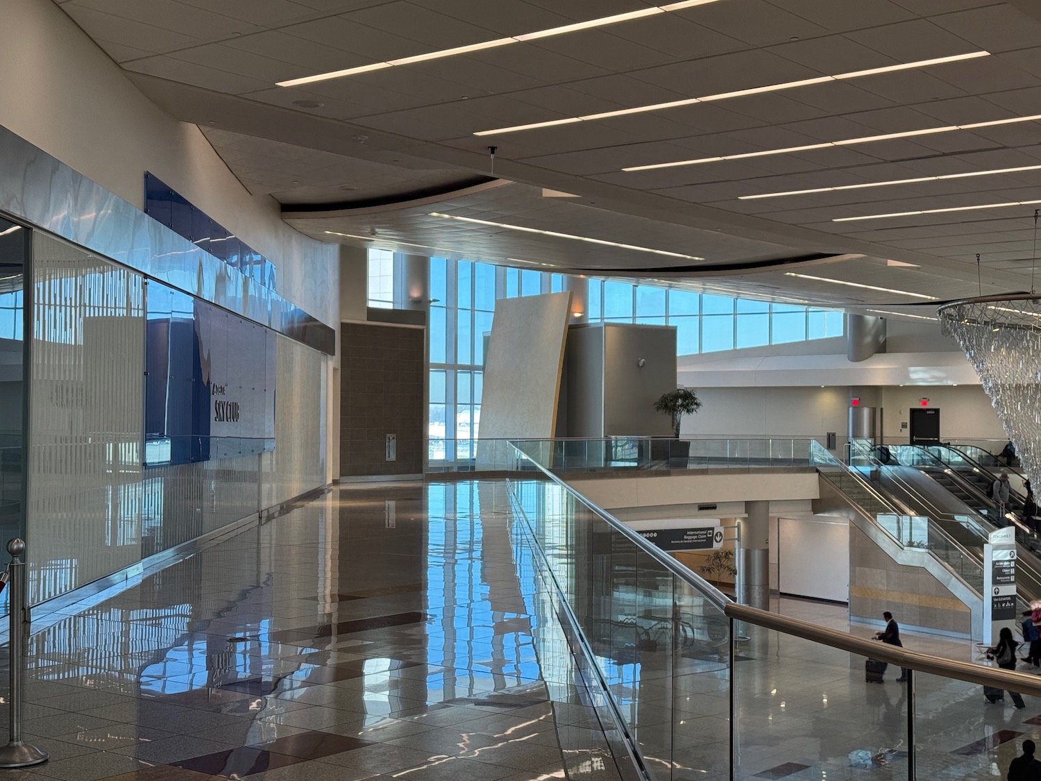 a large building with a glass floor and a staircase