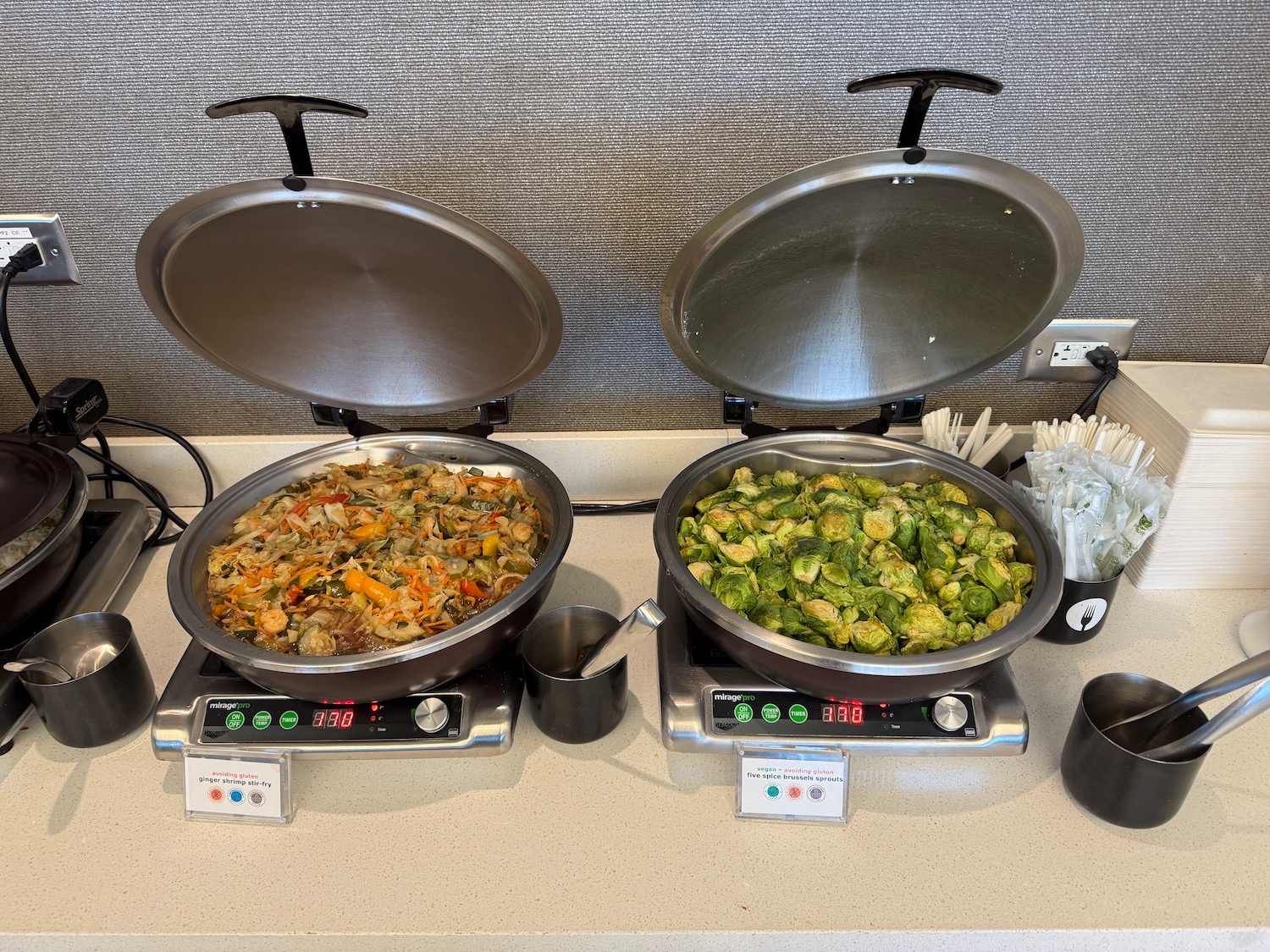 a two large pots with food in them
