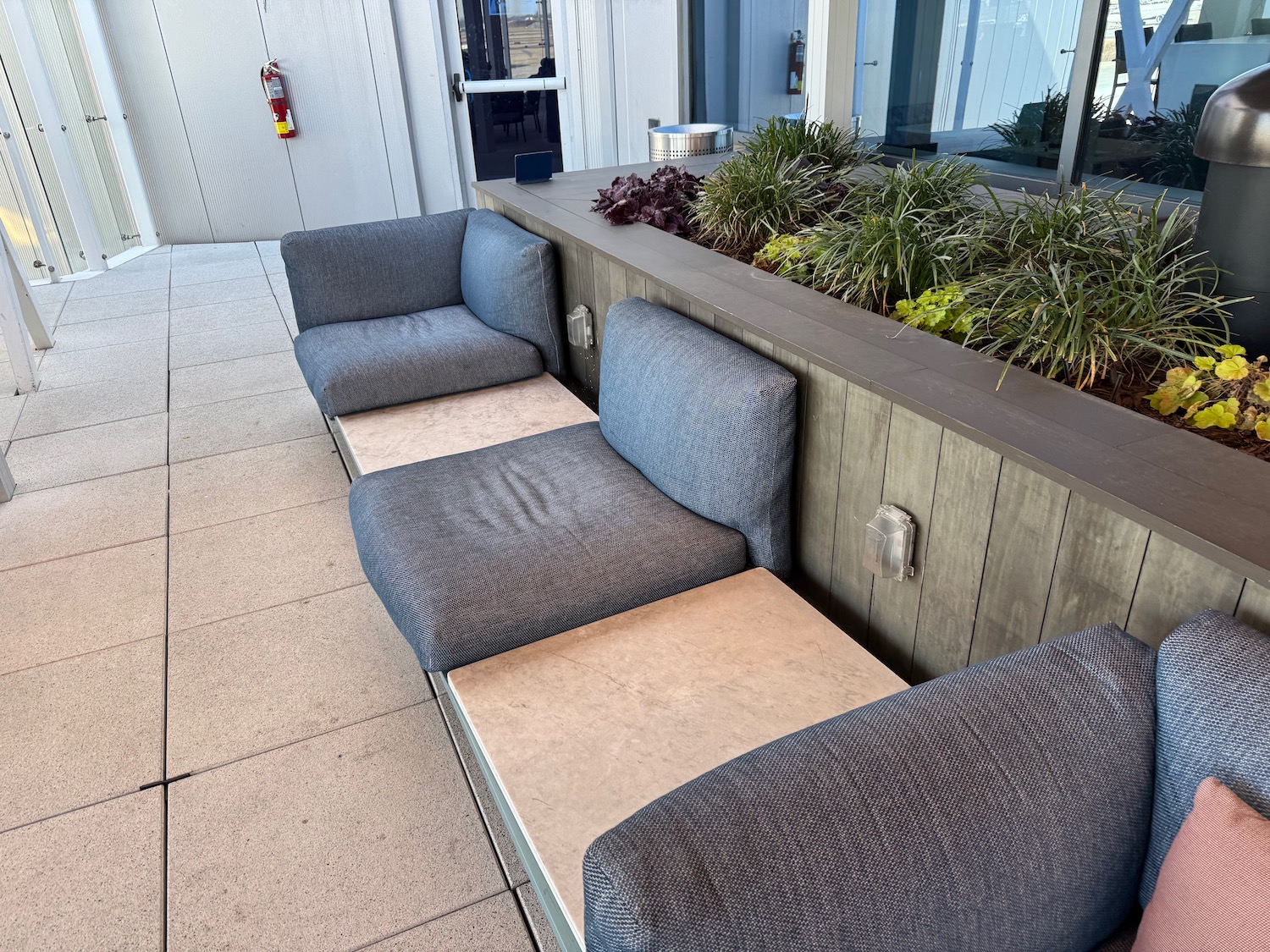 a couches and a table on a patio
