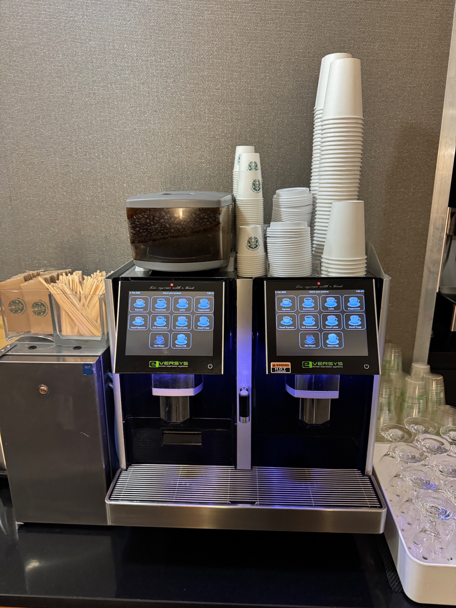 a machine with a stack of cups