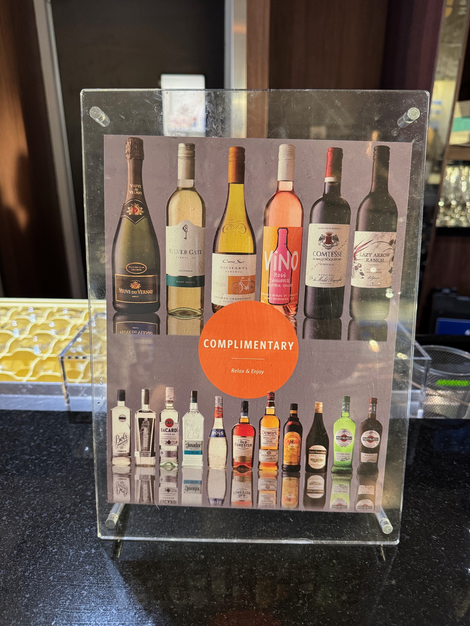 a sign with a group of bottles on it