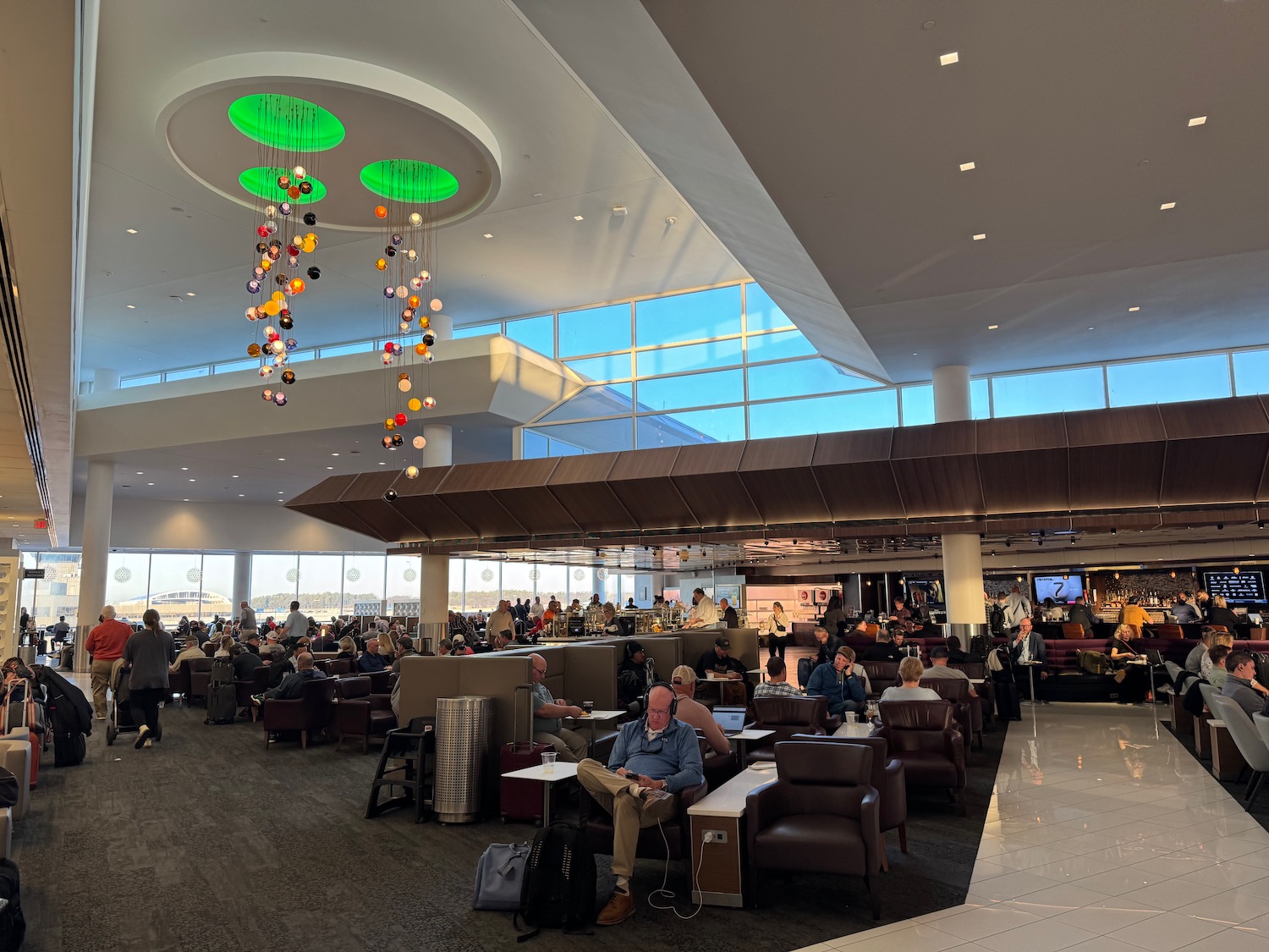 a group of people sitting in a lounge area