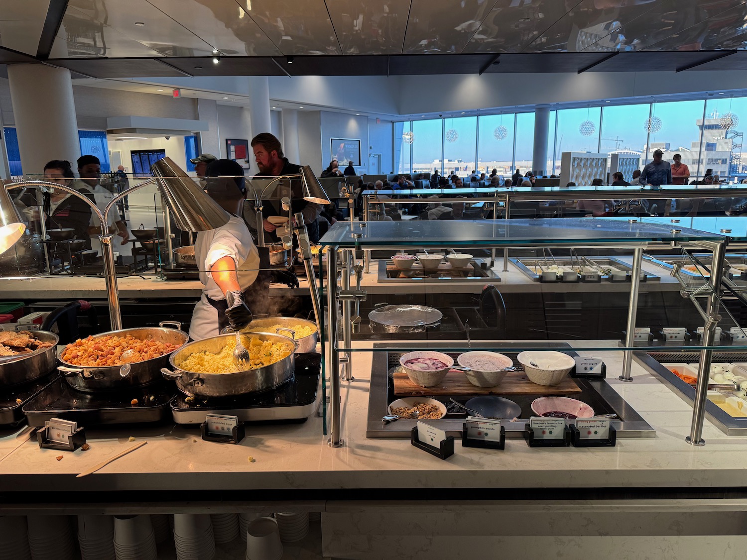 a person cooking food in a restaurant