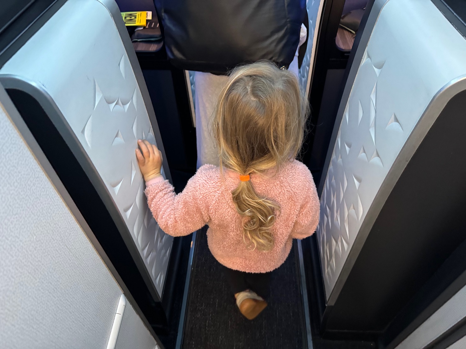 a child standing in a doorway