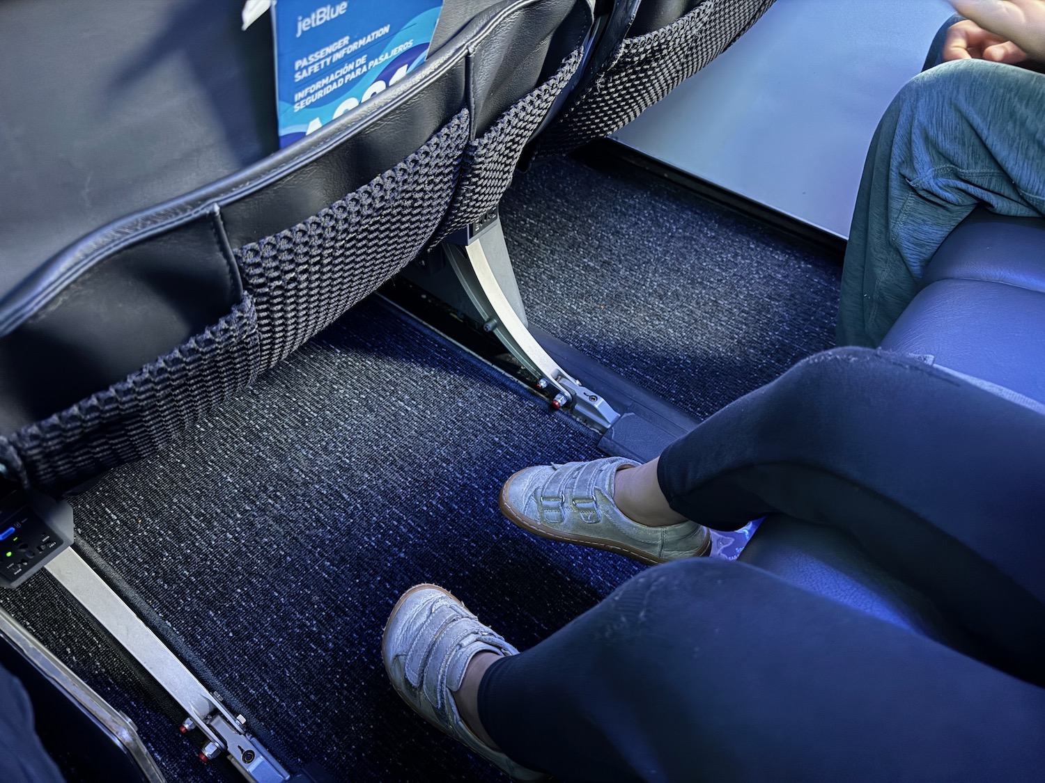 a person's feet in a seat
