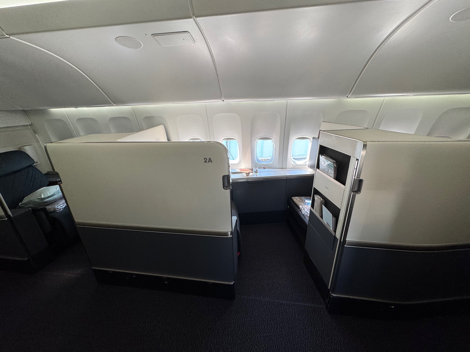 an airplane with a small bed and windows