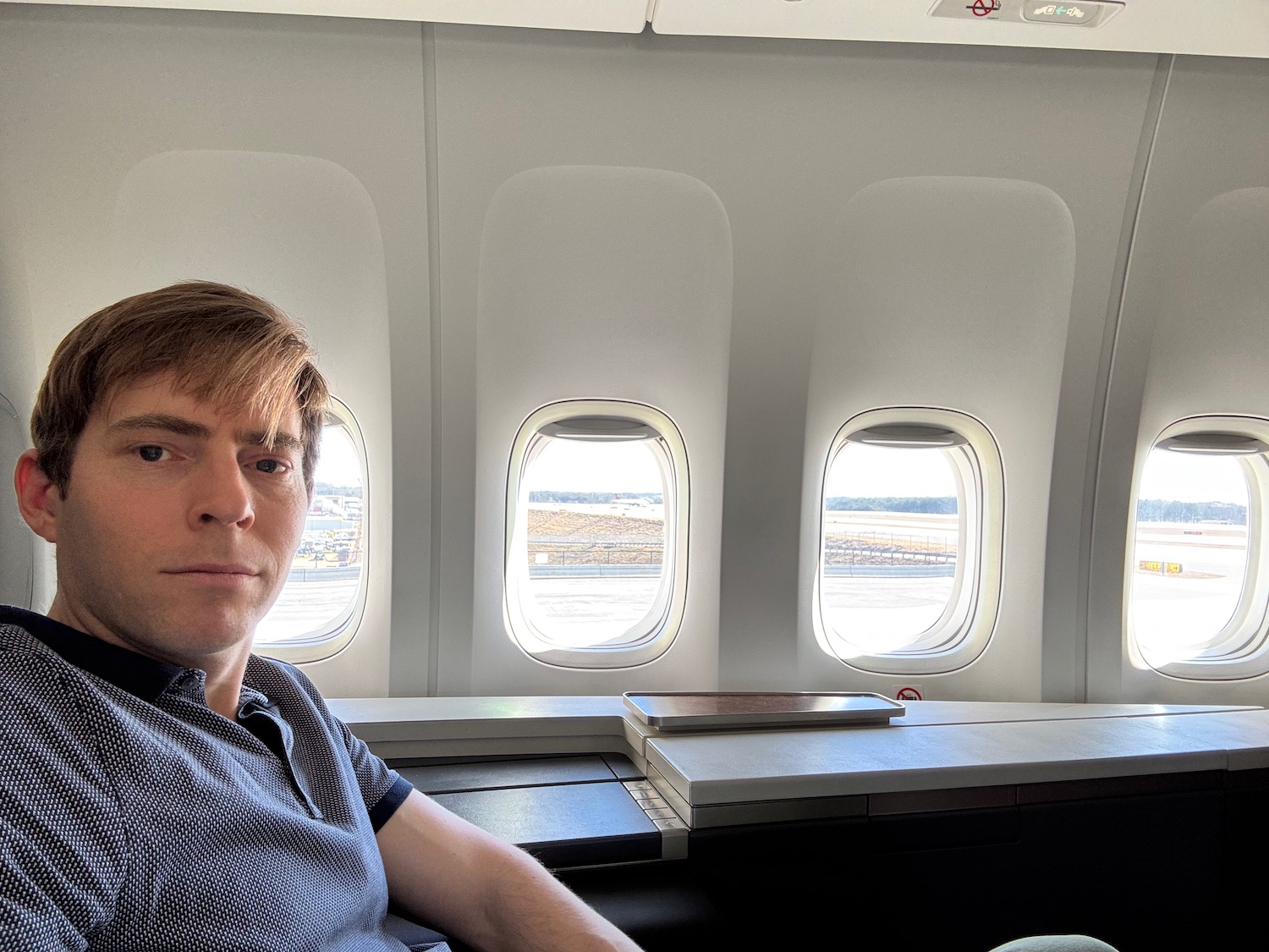 a man sitting in an airplane