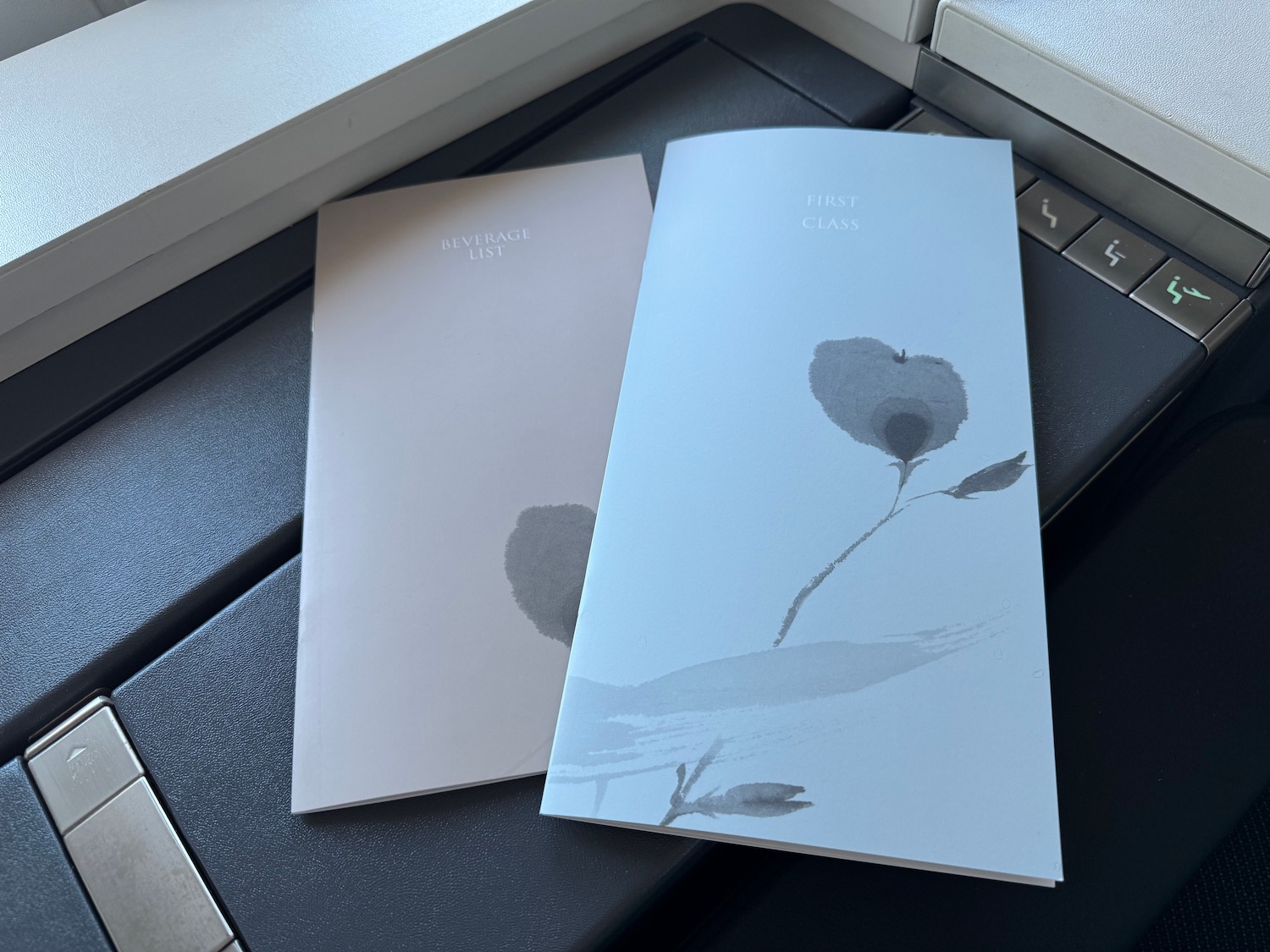 a couple of brochures on a keyboard