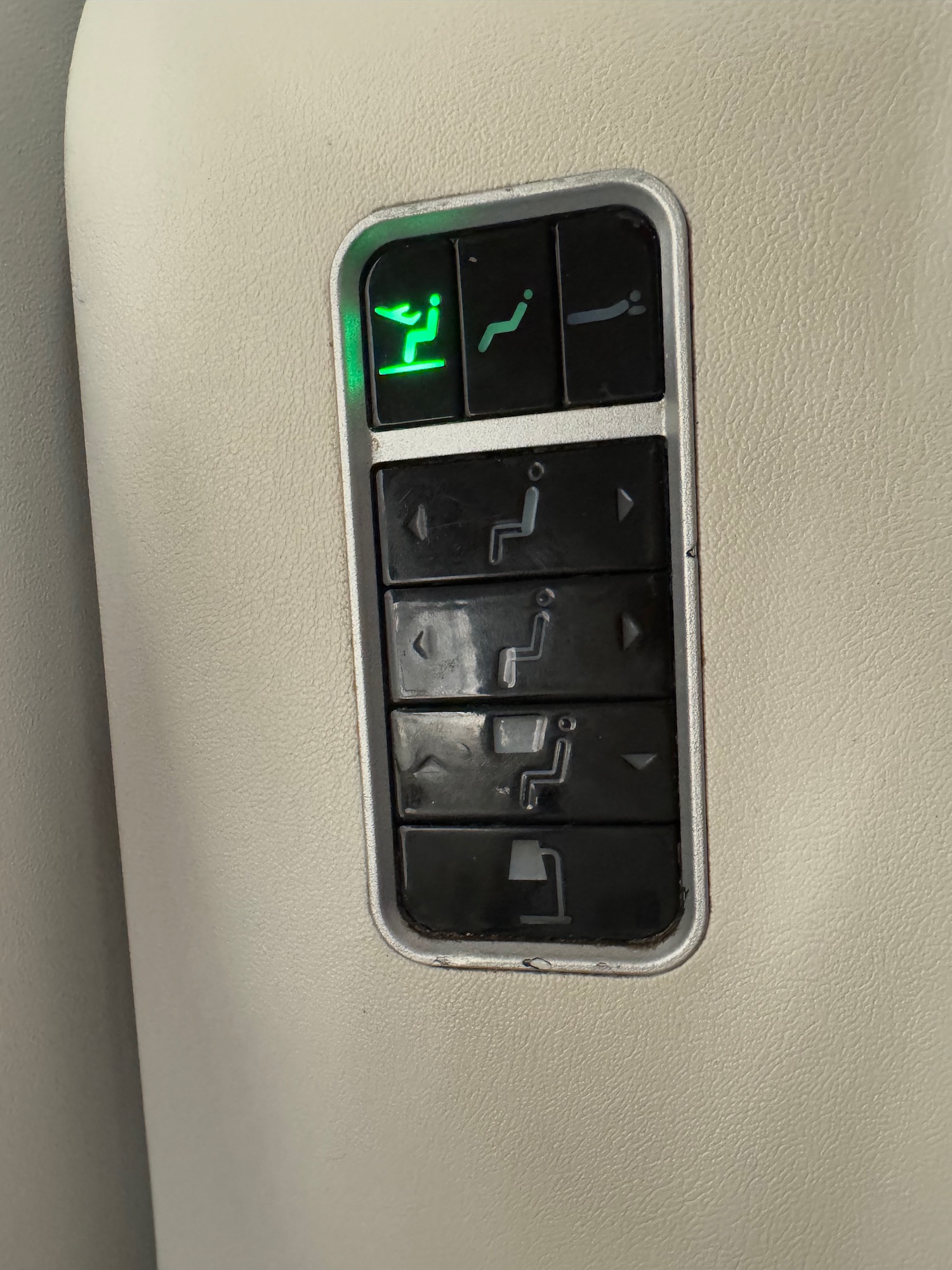 a button with a green light