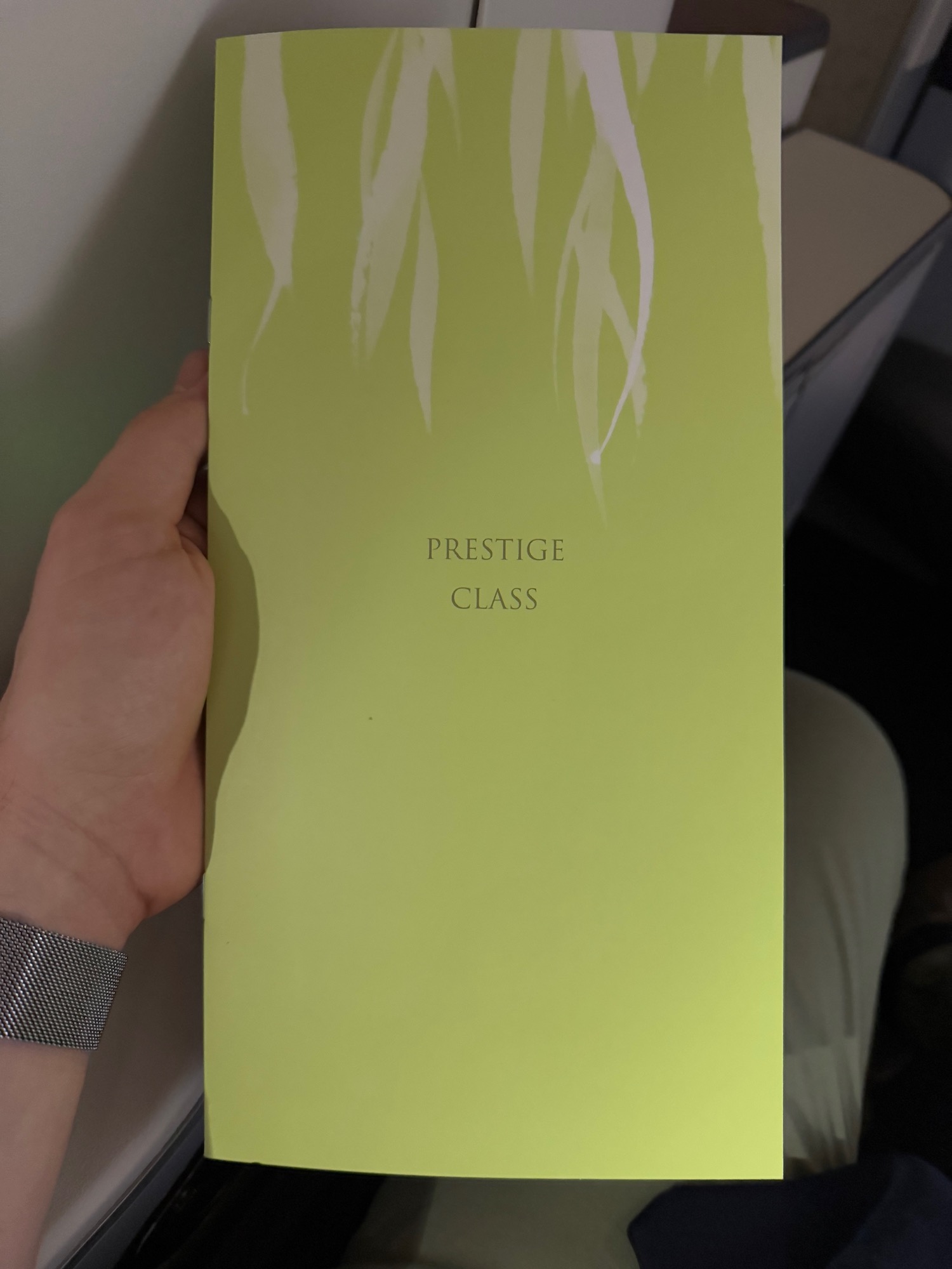 a hand holding a box