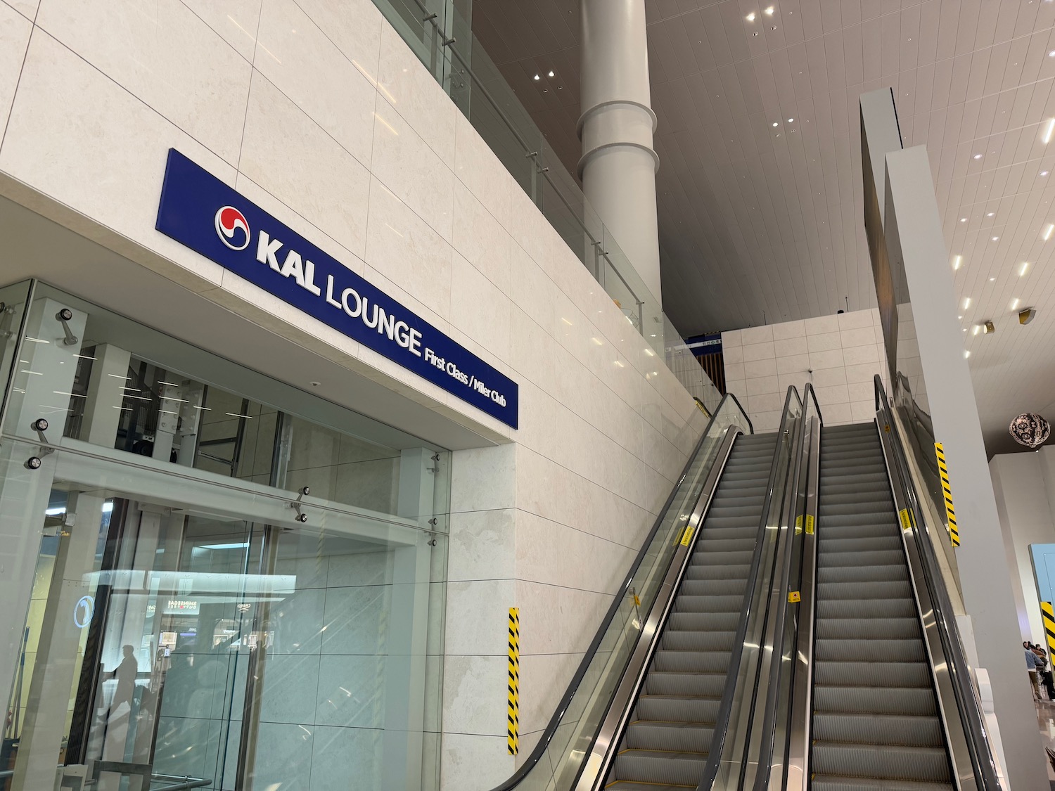 a escalator and a sign
