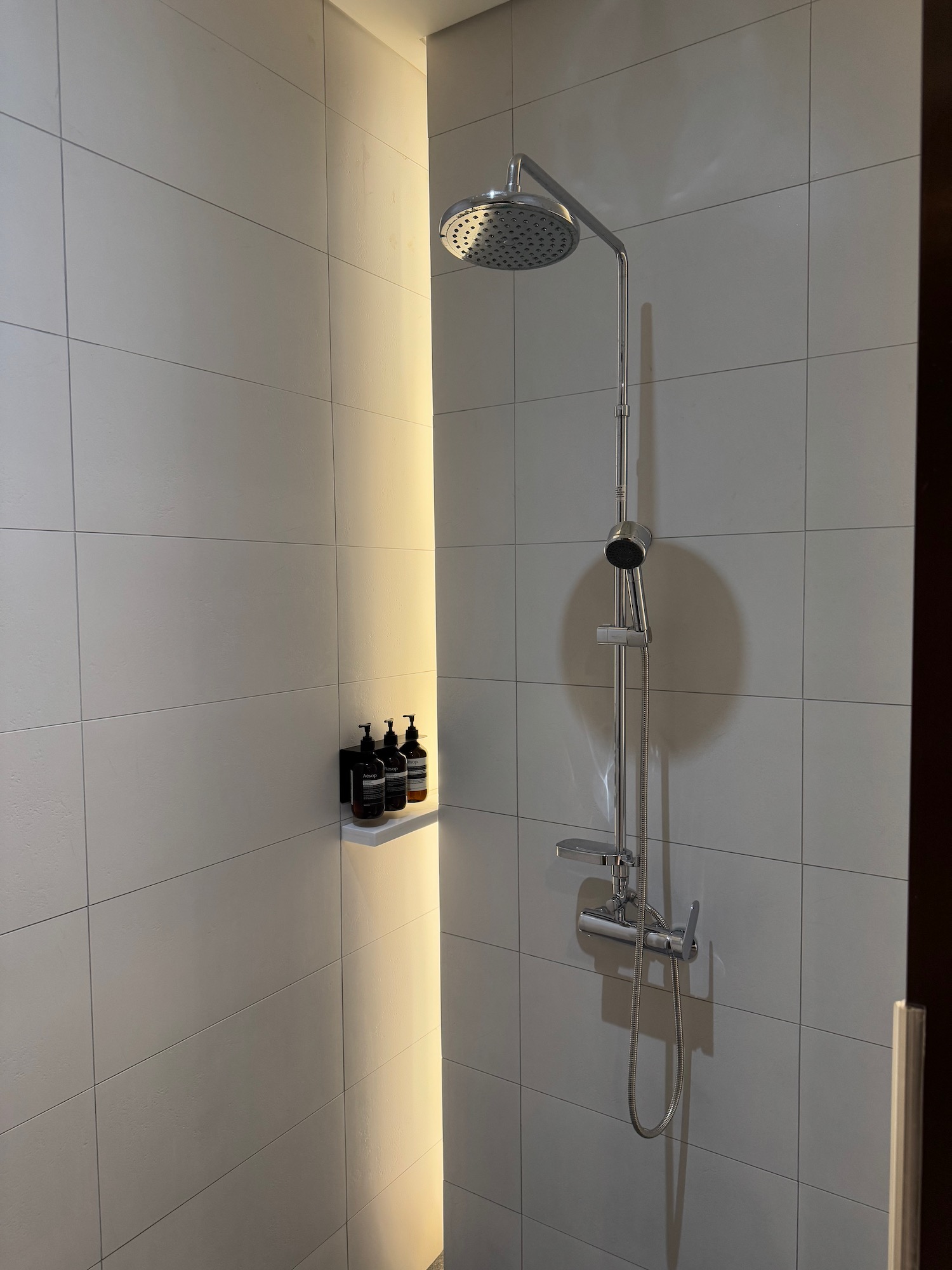 a shower head in a bathroom