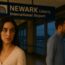 a woman looking at a man