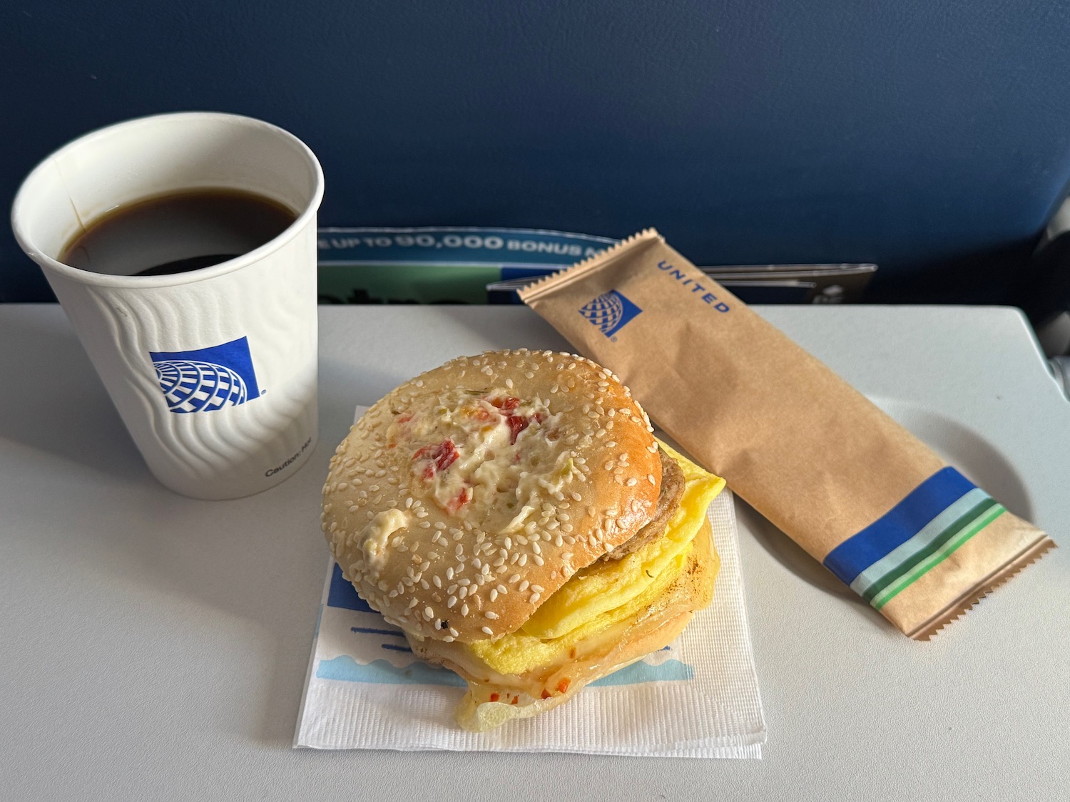 a sandwich and a cup of coffee