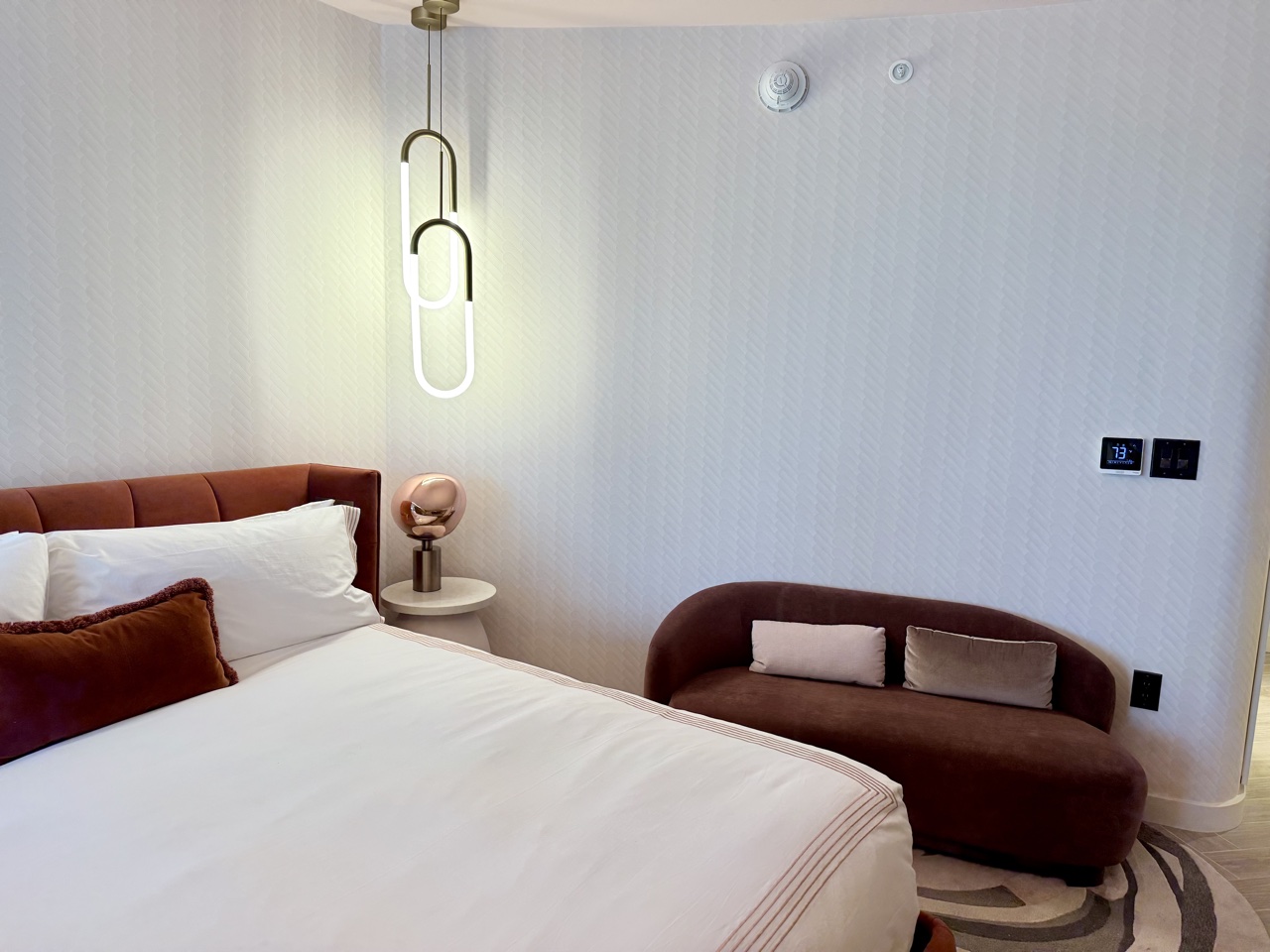 Thompson Miami Beach courtesy of Hyatt Hotels-king bed and seating