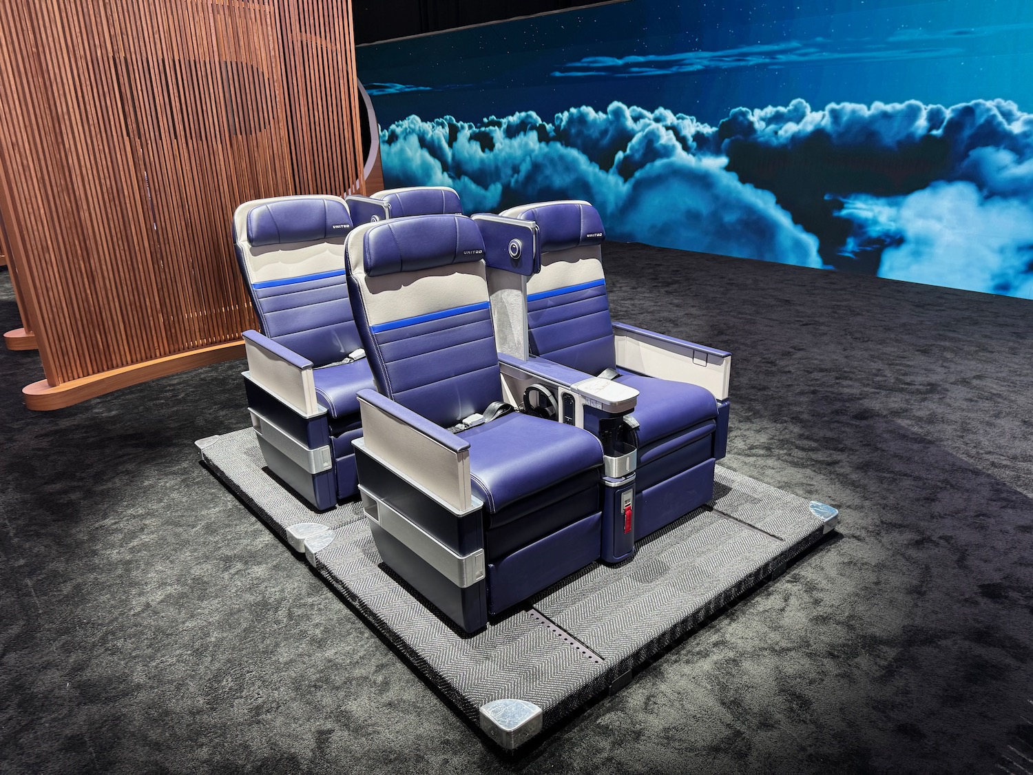 a group of blue and white chairs