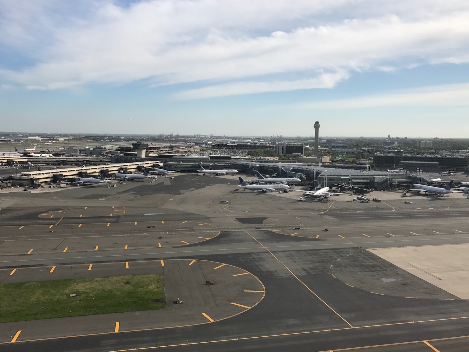an airport with airplanes on the runway