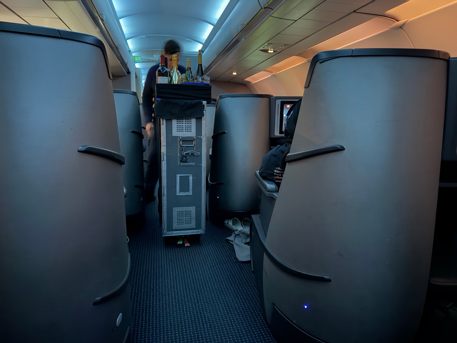 a person standing on a table in an airplane