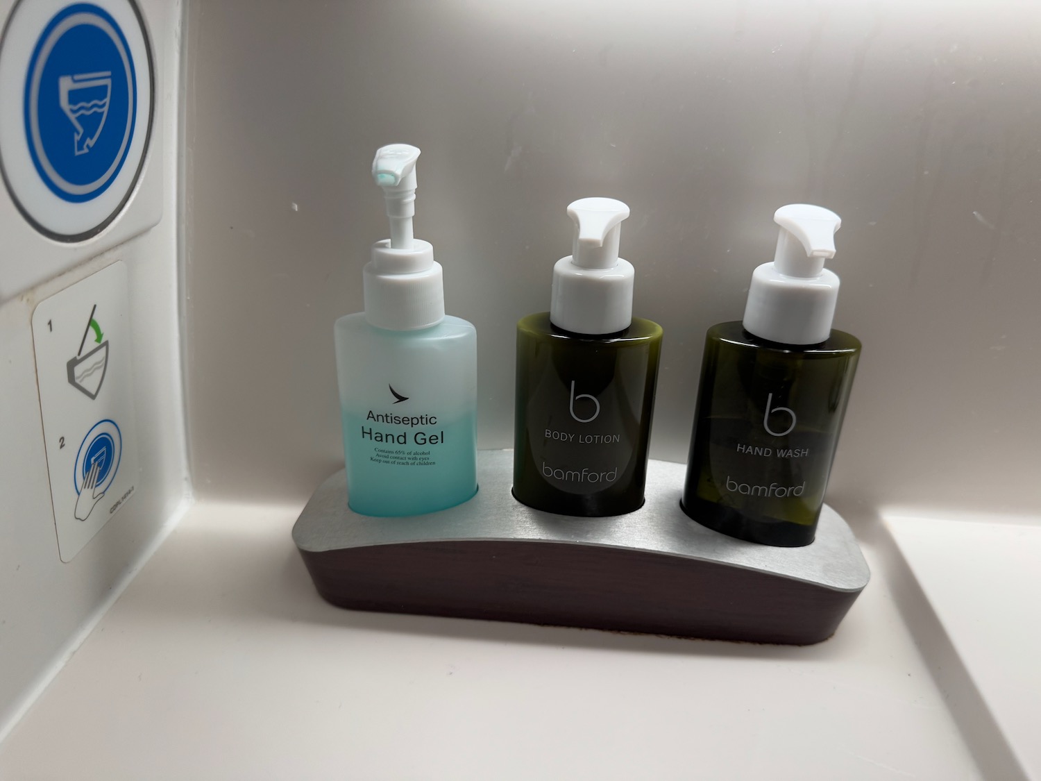 a group of hand gels on a stand
