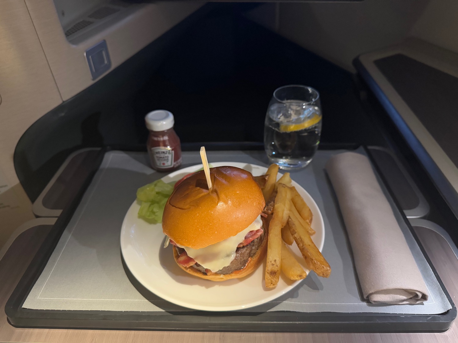 a burger and fries on a plate