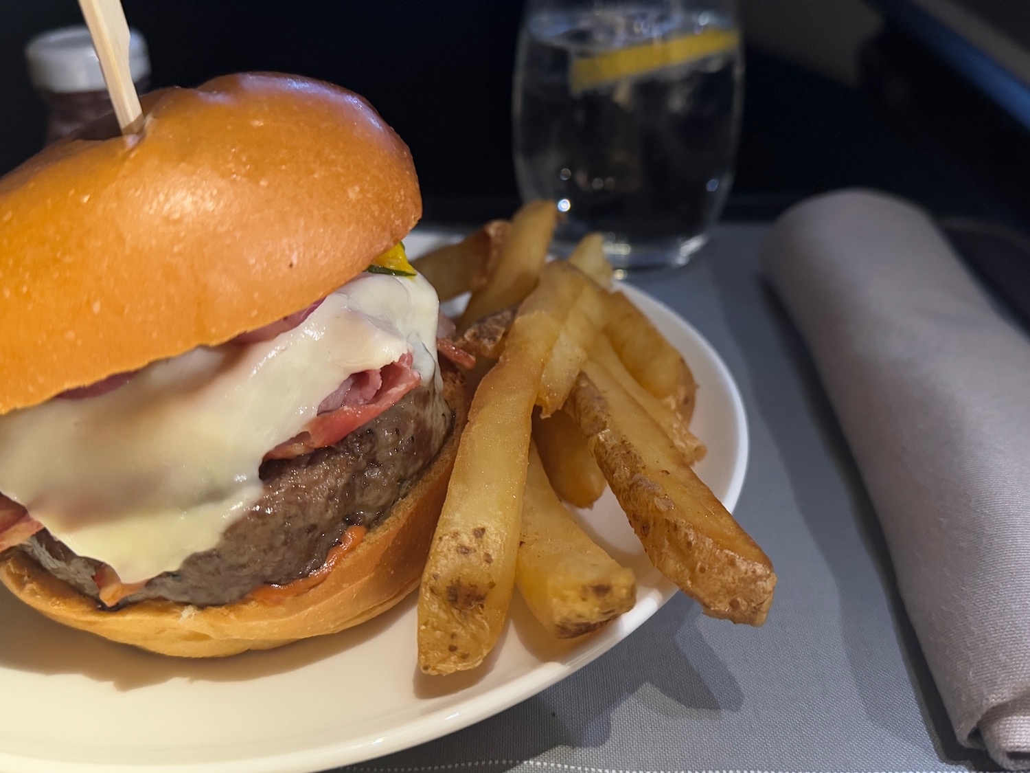 a burger and fries on a plate