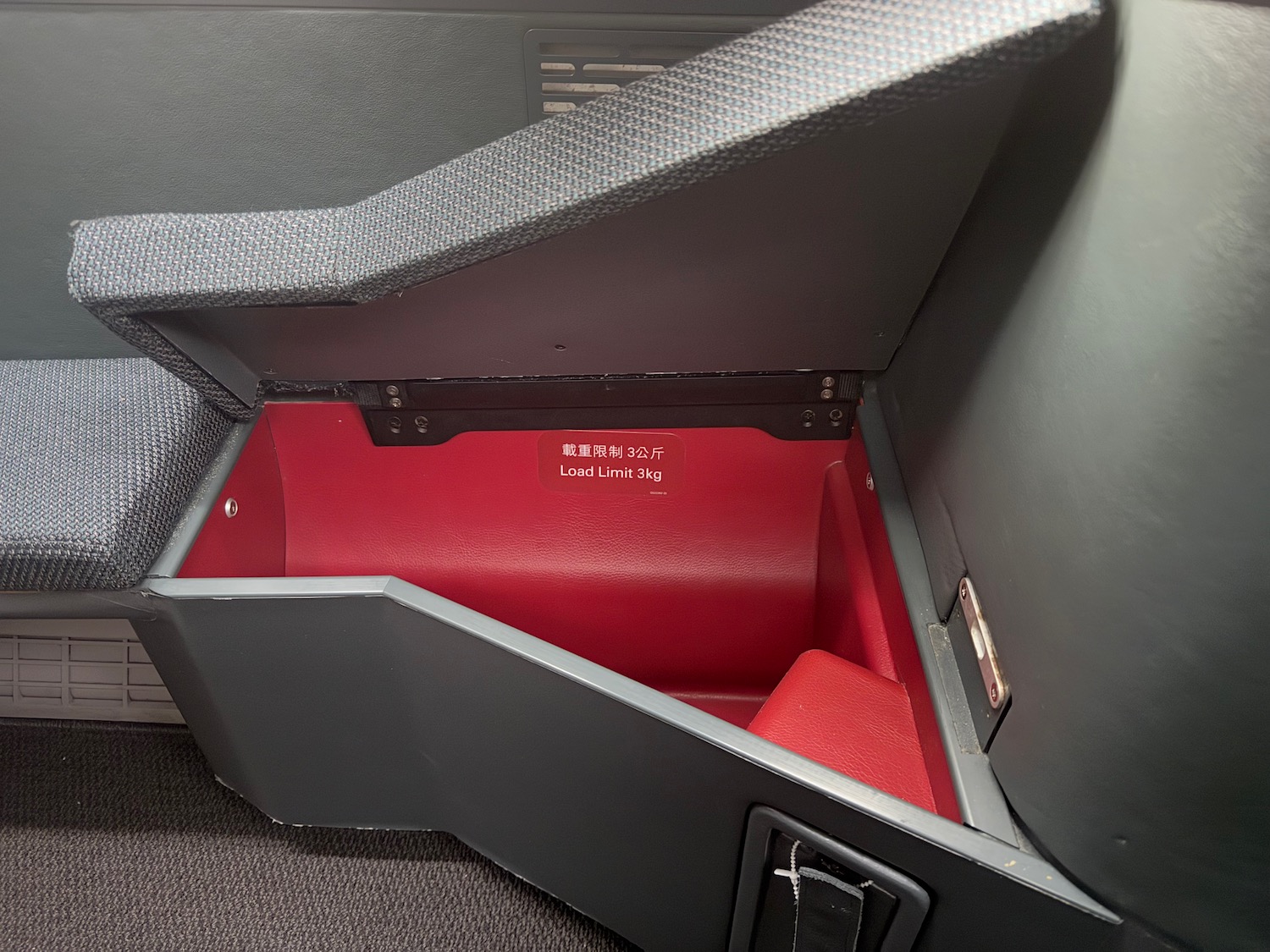a red and black object in a car