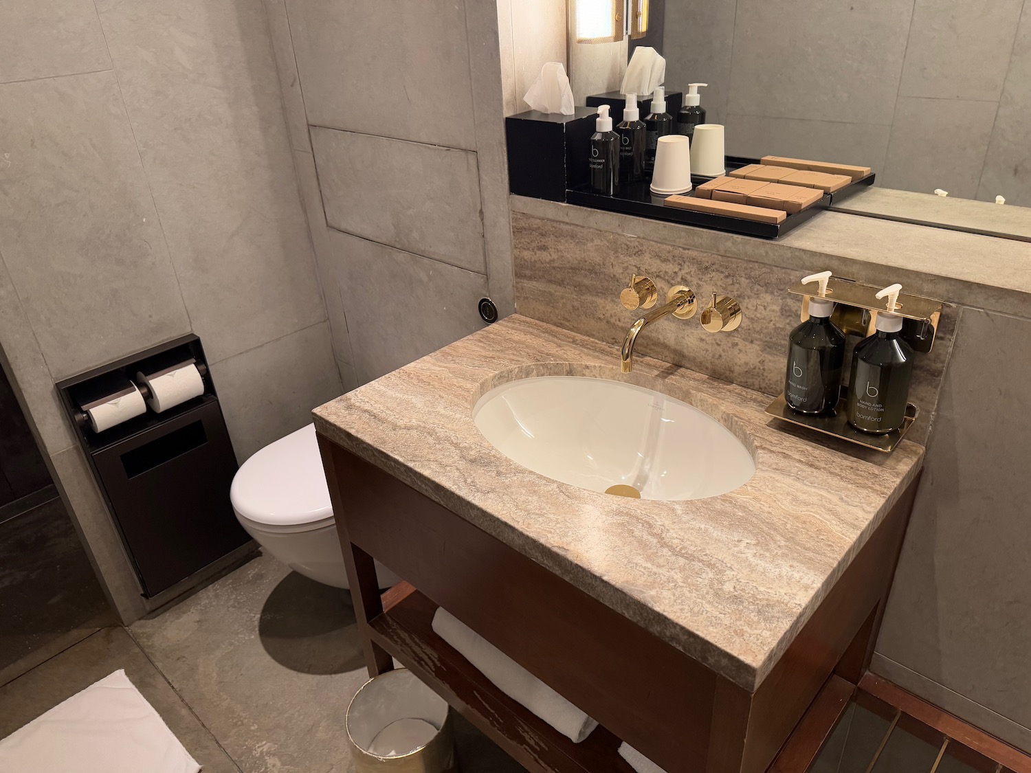 a bathroom with a sink and toilet