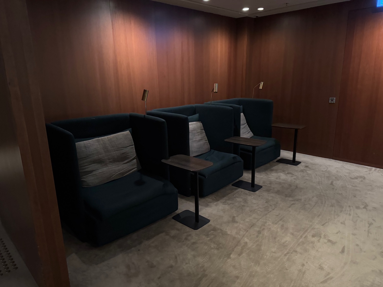 a room with chairs and tables