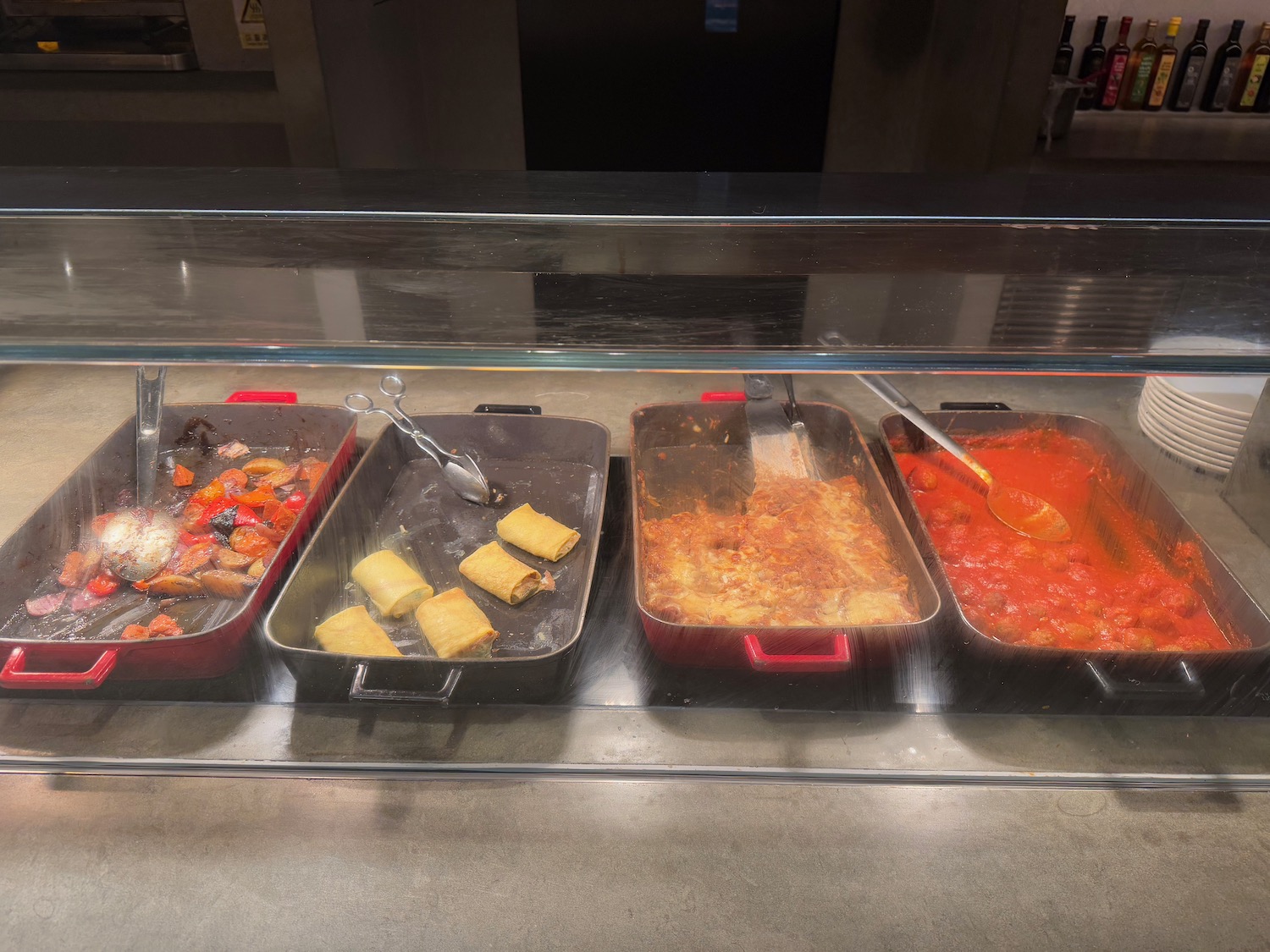 a row of food in pans
