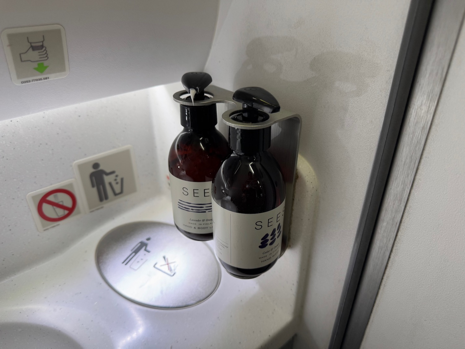 a soap dispenser on a sink