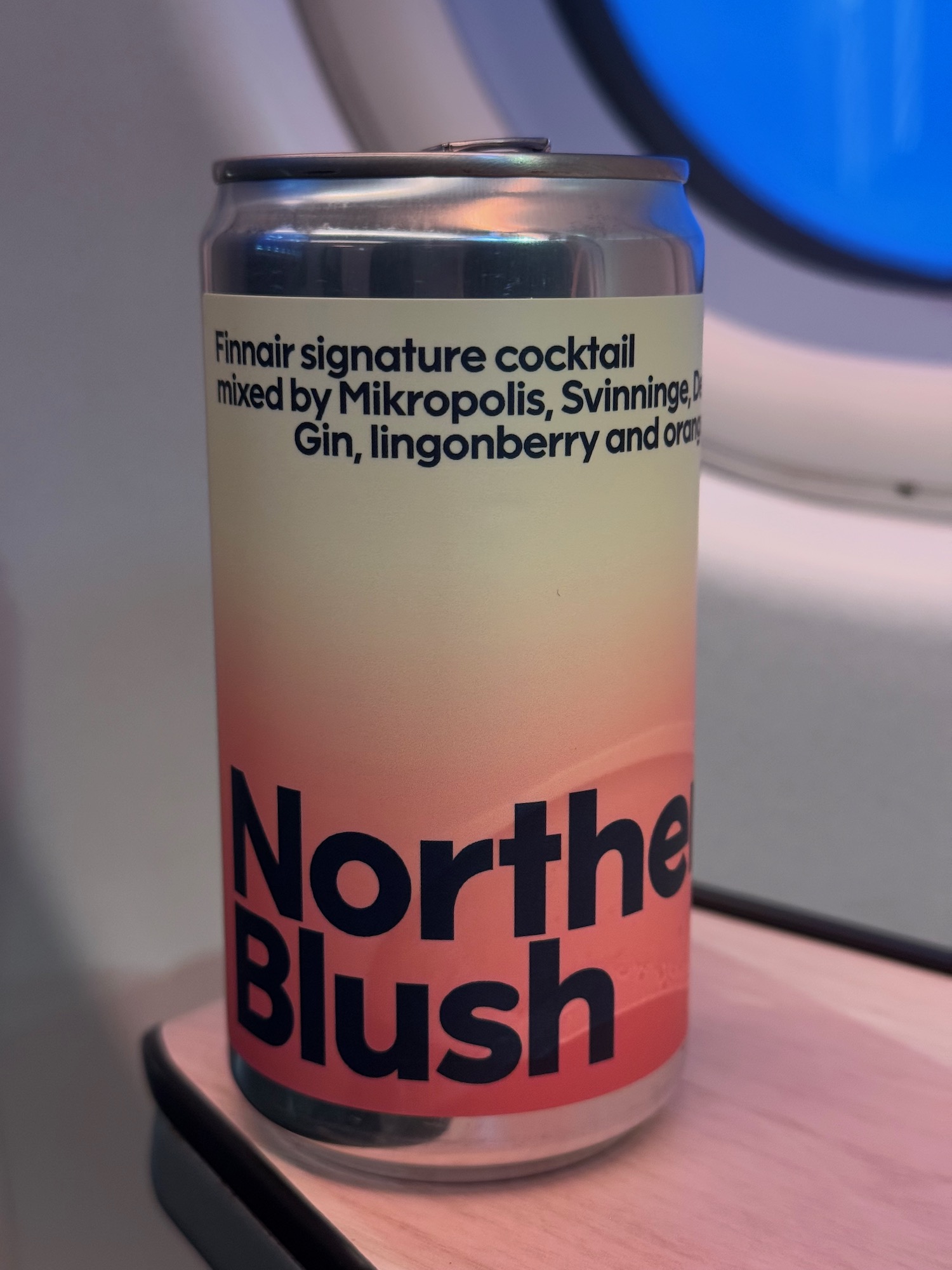 a can of beverage on a table
