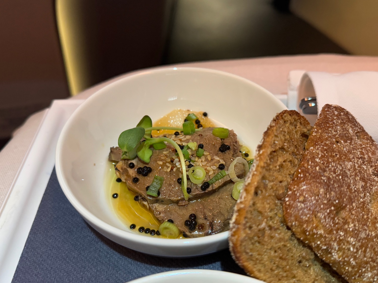 a bowl of food with bread