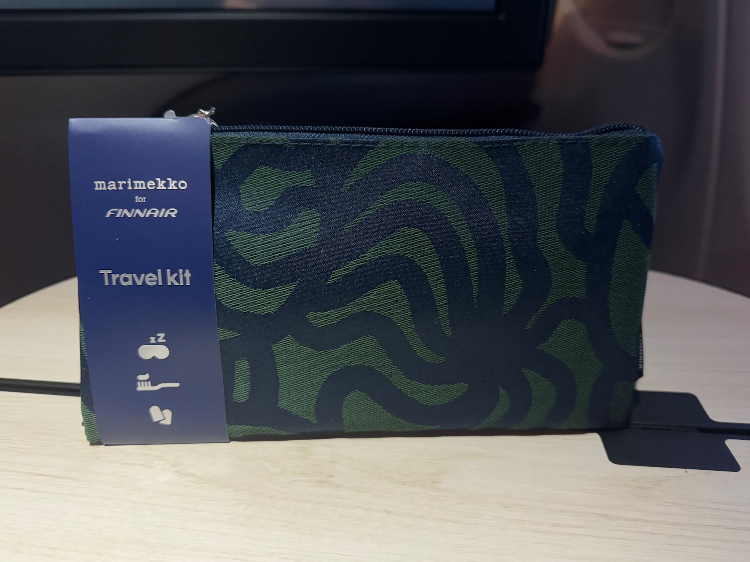 a green and blue travel kit