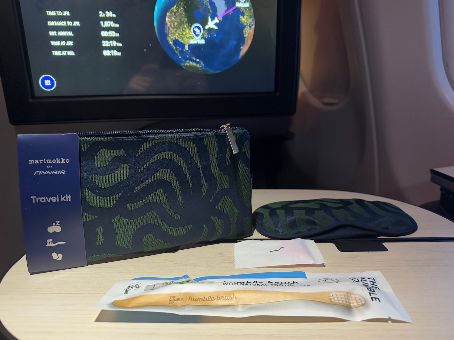 a bag and toothbrush on a table