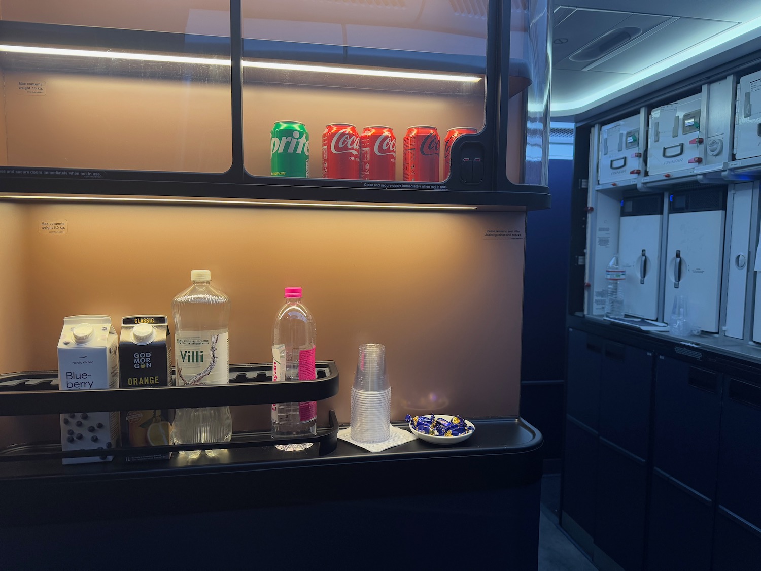 a shelf with drinks and beverages on it