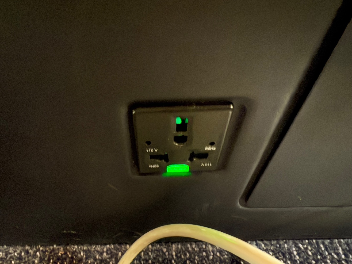 a green light on a wall