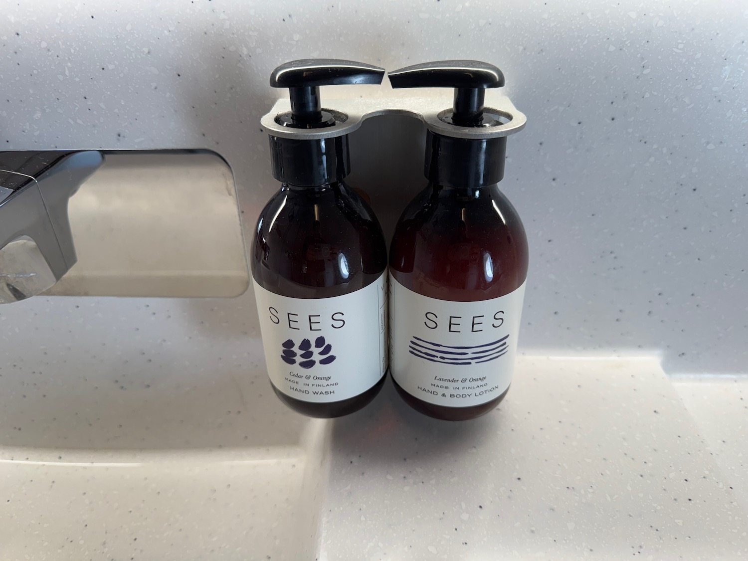 two bottles of liquid on a counter
