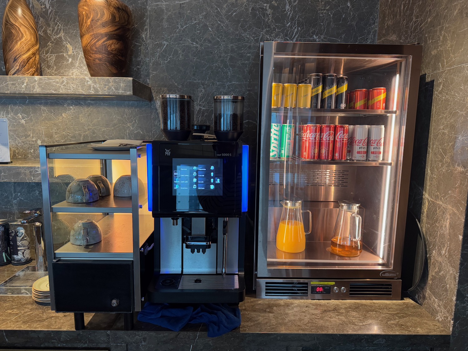 a coffee machine and beverage cooler