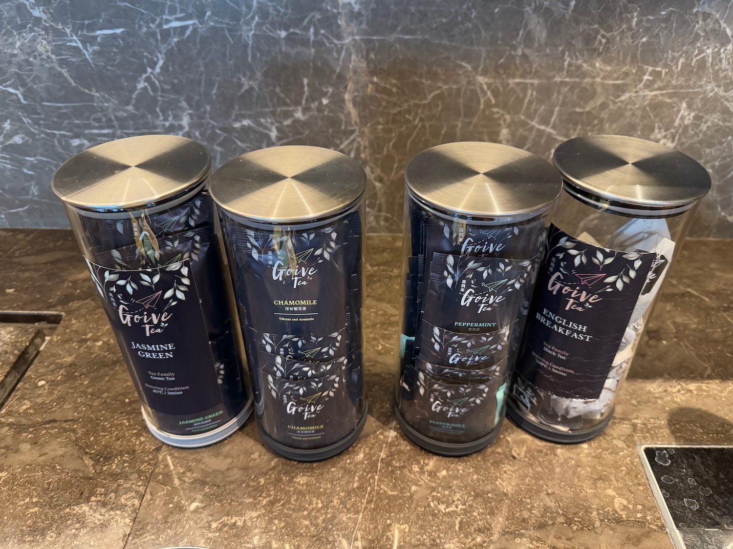 a group of containers with labels