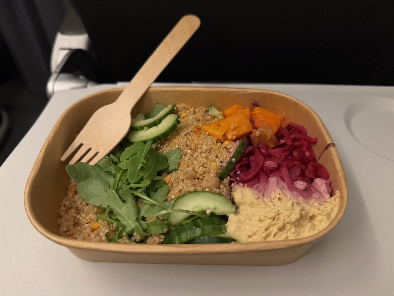 a bowl of food with a fork