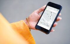 a hand holding a phone
